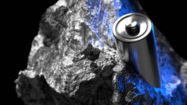 A silver battery rests on a piece of metallic rock with blue lighting, symbolizing biodegradable electronics.